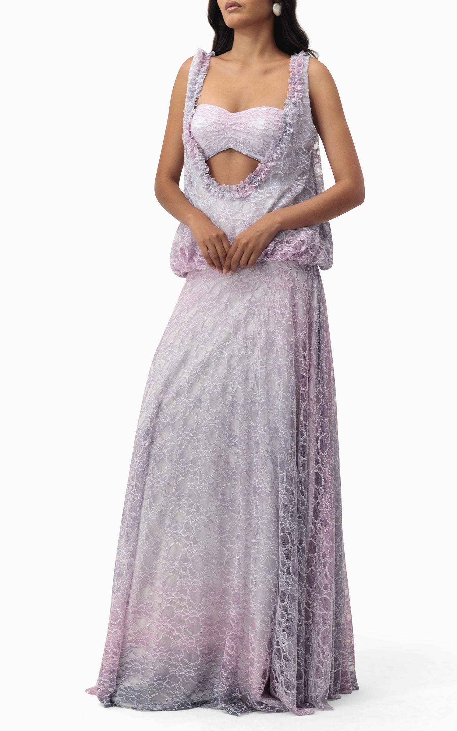 Model in The Gianna gown, lilac lace design with ombré effect and soft pleated overlay, angled view