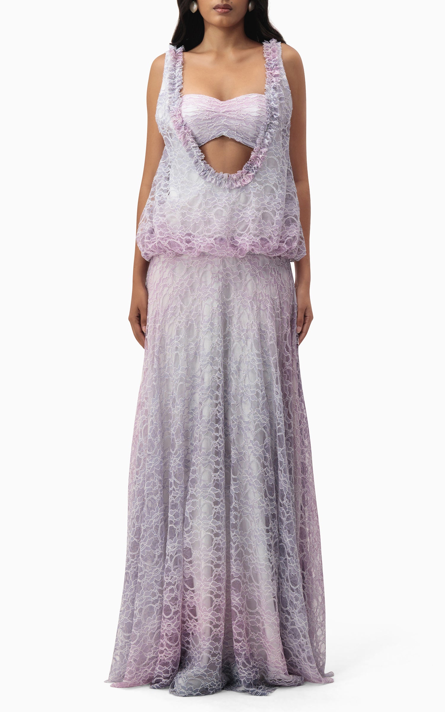 Model wearing The Gianna lilac ombré lace gown with bandeau cutout and sheer draped overlay, front view
