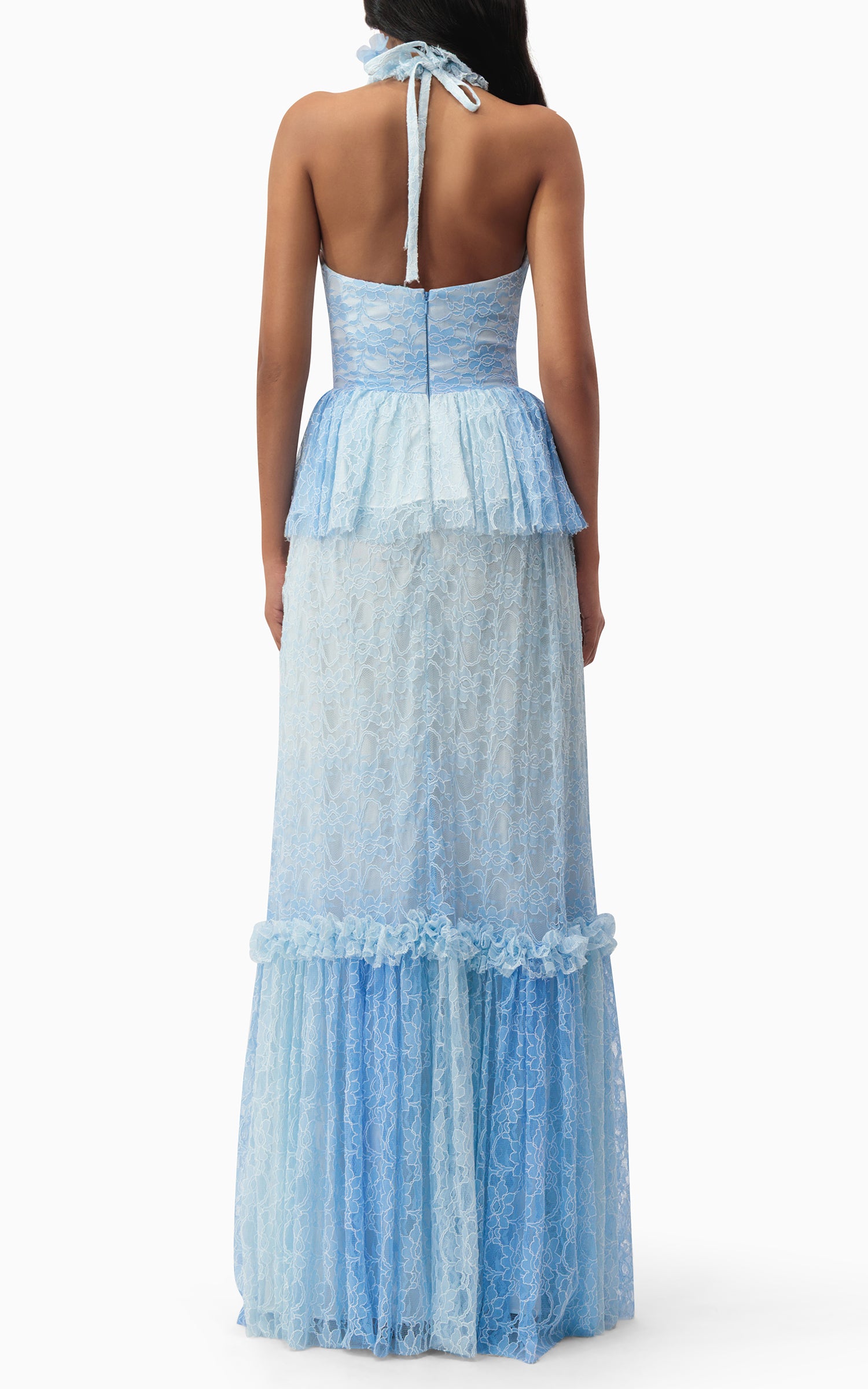 Model wearing halter blue lace dress with ruffles and peplum waist – perfect for beach weddings, summer events, and romantic getaways, back