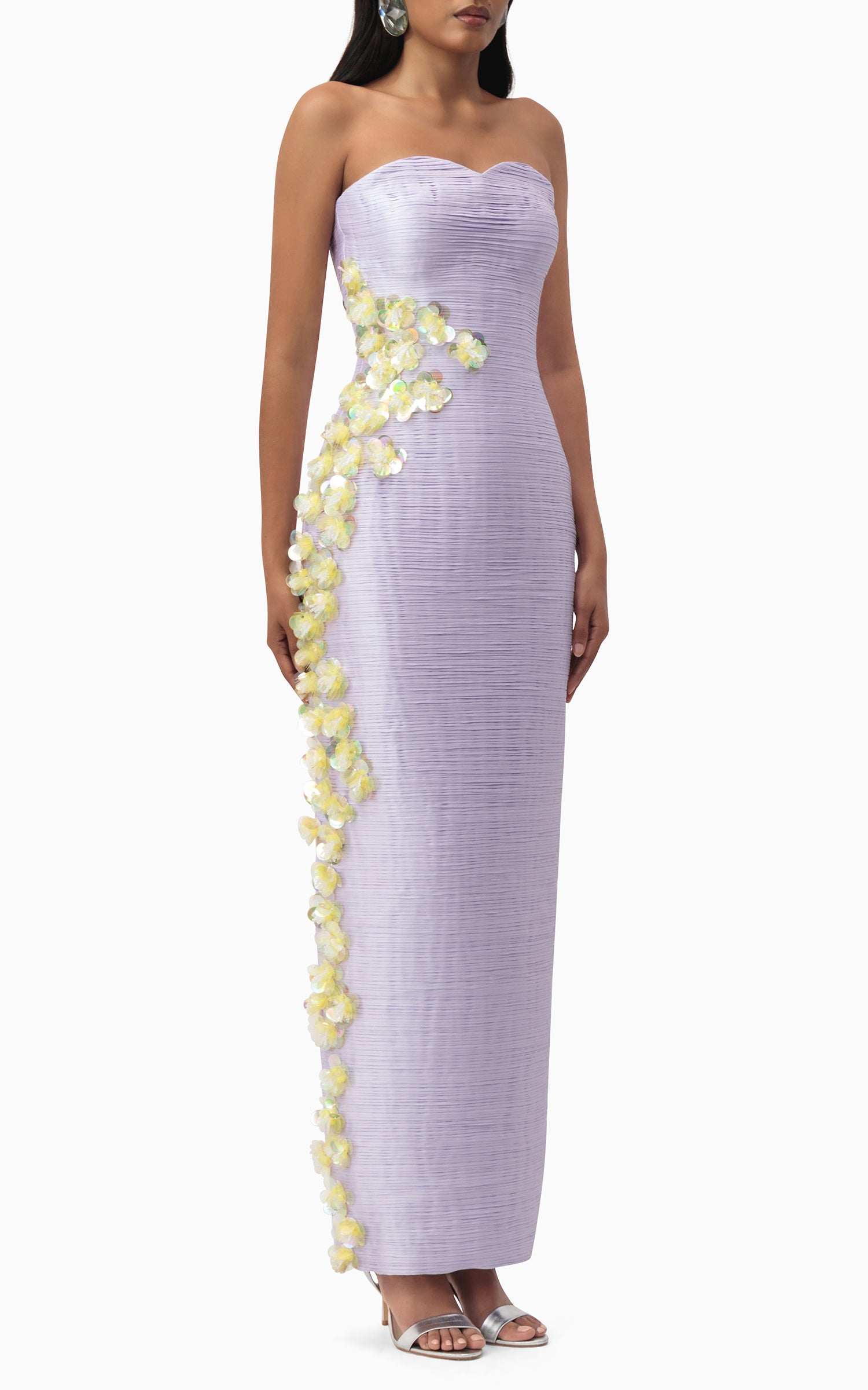 Model wearing lilac taffeta maxi dress with yellow floral detailing – perfect for evening events, weddings, or formal summer occasions side