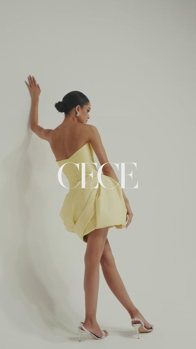 Yellow pleated taffeta dress with sculptural draping at the hip – a bold silhouette for gala nights, parties, and luxe events in the GCC or abroad, video
